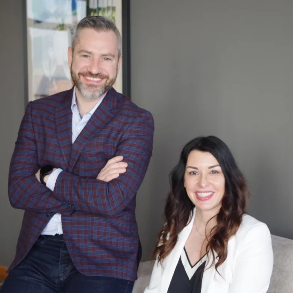 Michael Dinsio and Paula Quinn, two dental consultants sitting side by side