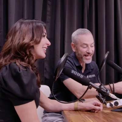 Mike and Paula Podcasting in a studio about dental consulting